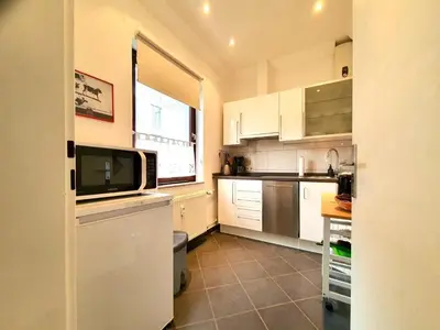Küche/Küchenzeile in der Unterkunft Pärchenwohnung Strandallee