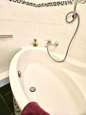 Ein Badezimmer in der Unterkunft Pärchenwohnung Strandallee