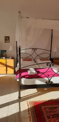 Ein Bett oder Betten in einem Zimmer der Unterkunft Ferienwohnung Ulinde