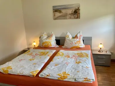 Ein Bett oder Betten in einem Zimmer der Unterkunft Ferienhaus Spatzenvilla