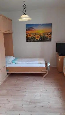 Ein Bett oder Betten in einem Zimmer der Unterkunft 1-Zimmer-Apartment 2 Hochparterre