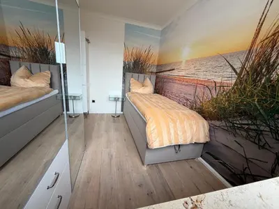 Ein Bett oder Betten in einem Zimmer der Unterkunft Tiffany´s Ferienapartments sind alles, außer... gewöhnlich!!!