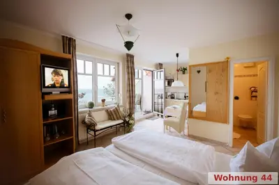 Ein Bett oder Betten in einem Zimmer der Unterkunft Strandhaus Brunhild