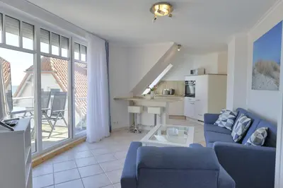 Ein Sitzbereich in der Unterkunft Strandhaus Brunhild