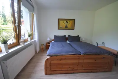 Ein Bett oder Betten in einem Zimmer der Unterkunft Ferienhaus Abendsonne