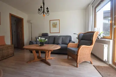 Ein Sitzbereich in der Unterkunft Ferienhaus Abendsonne
