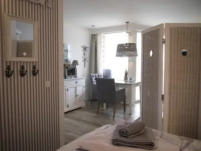 Ein Bett oder Betten in einem Zimmer der Unterkunft Strandperle 5