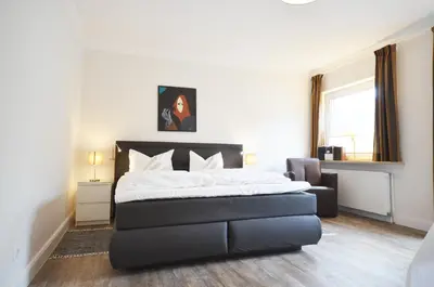 Ein Bett oder Betten in einem Zimmer der Unterkunft Ostseehaus Dreesen