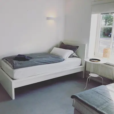 Ein Bett oder Betten in einem Zimmer der Unterkunft Ferienwohnung 1 Hof Flüh