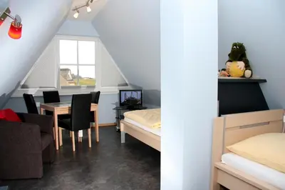 Ein Bett oder Betten in einem Zimmer der Unterkunft Villa DUXCAAR