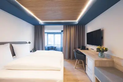 Ein Bett oder Betten in einem Zimmer der Unterkunft The Oceans