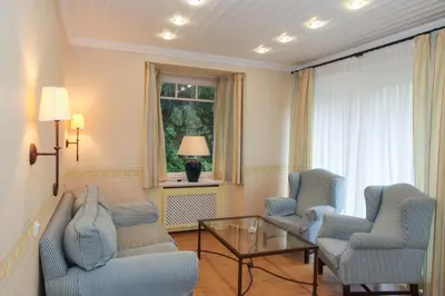 Ein Sitzbereich in der Unterkunft Landhaus Töpferhof bei Travemünde