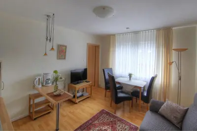 Ein Sitzbereich in der Unterkunft Aparthotel Klara