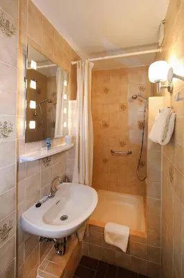Ein Badezimmer in der Unterkunft Aparthotel Klara