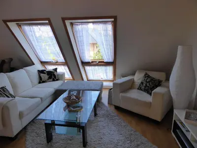 Ein Sitzbereich in der Unterkunft Ostseeferienwohnung Storchennest