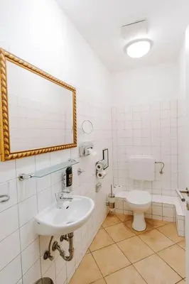 Ein Badezimmer in der Unterkunft Ferienwohnungen am Holstentor