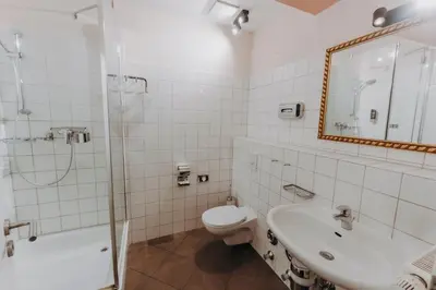 Ein Badezimmer in der Unterkunft Ferienwohnungen am Holstentor