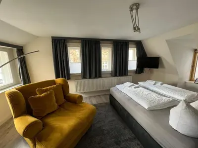Ein Bett oder Betten in einem Zimmer der Unterkunft Ferienhaus Wiethüchter
