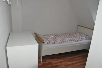 Ein Bett oder Betten in einem Zimmer der Unterkunft Haus Tesch