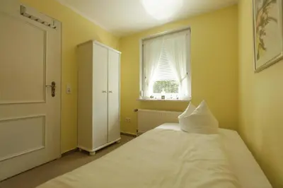 Ein Bett oder Betten in einem Zimmer der Unterkunft Das Sonnenblumenhaus