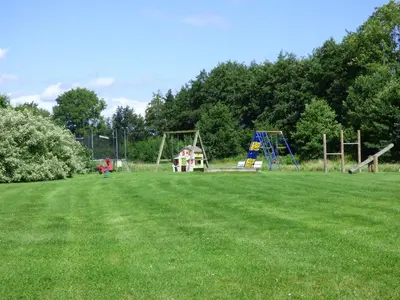 Ein Garten an der Unterkunft Haus Seeblick