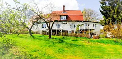 Ein Garten an der Unterkunft romantische Ferienwohnung Sachsenhof 2