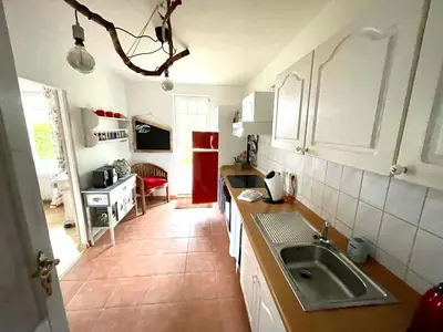 Küche/Küchenzeile in der Unterkunft romantische Ferienwohnung Sachsenhof 3