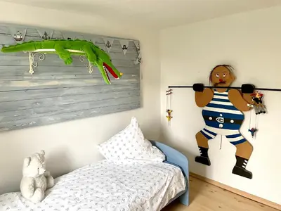 Ein Bett oder Betten in einem Zimmer der Unterkunft romantische Ferienwohnung Sachsenhof 3