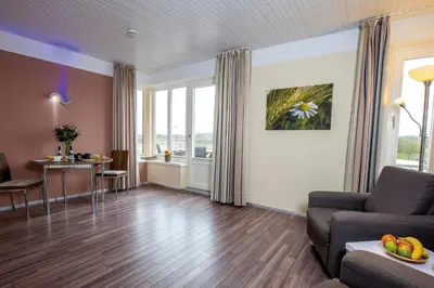 Ein Sitzbereich in der Unterkunft ancora Marina Haus 2 Nr 08, Typ 1