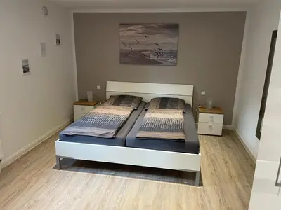 Ein Bett oder Betten in einem Zimmer der Unterkunft Ferienwohnung mit Seeblick