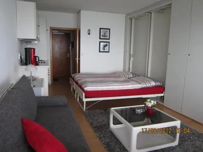 Ein Bett oder Betten in einem Zimmer der Unterkunft Seeblick Apartment - in Plaza (Maritim) Residenz