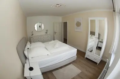Ein Bett oder Betten in einem Zimmer der Unterkunft Jessop Haus