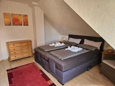 Ein Bett oder Betten in einem Zimmer der Unterkunft Ferienwohnung Haus Rita