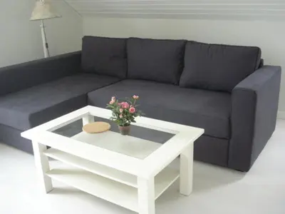 Ein Sitzbereich in der Unterkunft Ferienwohnung Möwennest
