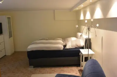 Ein Bett oder Betten in einem Zimmer der Unterkunft Ferienwohnung am Meer