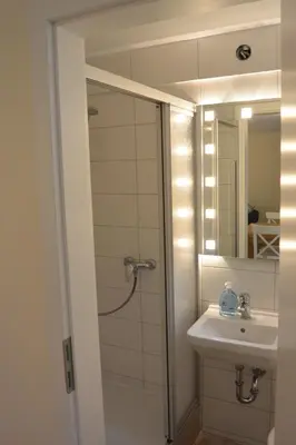 Ein Badezimmer in der Unterkunft Ferienwohnung am Meer