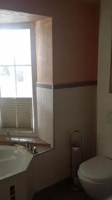 Ein Badezimmer in der Unterkunft Ferienwohnung am Meer