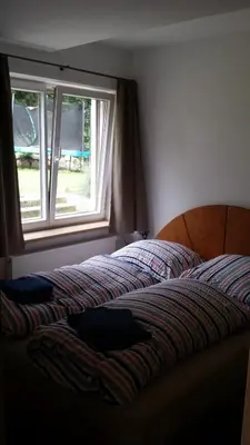 Ein Bett oder Betten in einem Zimmer der Unterkunft Ferienwohnung am Meer