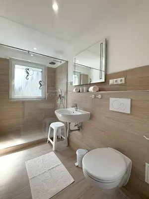 Ein Badezimmer in der Unterkunft Gästehaus Passat