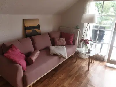 Ein Sitzbereich in der Unterkunft Apartment am Stadtsee