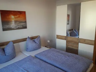 Ein Bett oder Betten in einem Zimmer der Unterkunft Ferienwohnung Berger