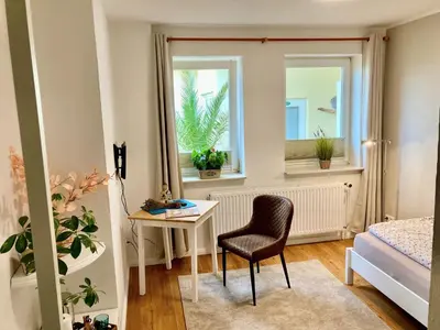 Ein Bett oder Betten in einem Zimmer der Unterkunft Gästehaus Langhals