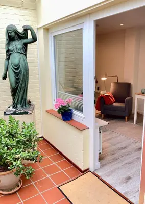 Ein Sitzbereich in der Unterkunft Gästehaus Langhals