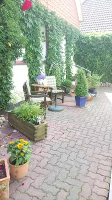 Ein Garten an der Unterkunft Gästehaus Langhals