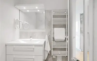 Ein Badezimmer in der Unterkunft Dünenvilla 19, Whg 2
