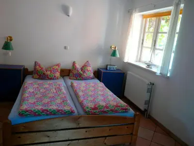 Ein Bett oder Betten in einem Zimmer der Unterkunft Landhaus-Marwede App 2