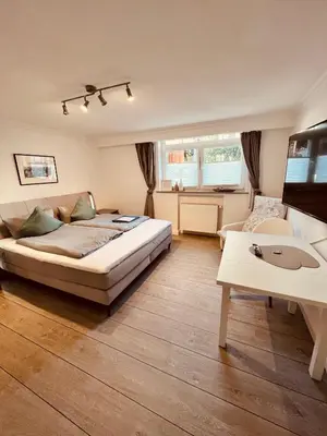Ein Bett oder Betten in einem Zimmer der Unterkunft Ostseehaus Dreesen Souterrain