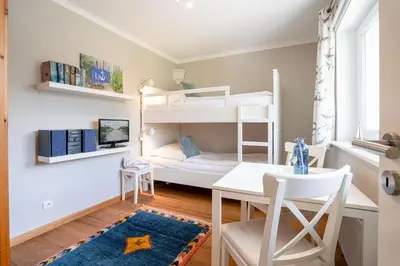 Ein Bett oder Betten in einem Zimmer der Unterkunft (BIR14) Haus am Birkenweg