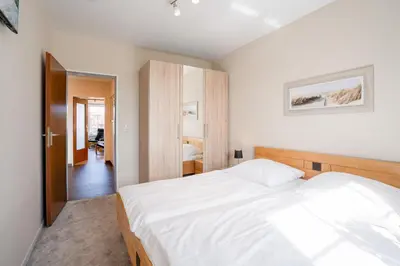 Ein Bett oder Betten in einem Zimmer der Unterkunft (DKK9)- Ferienwohnung Möwennest