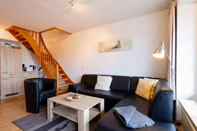 Ein Sitzbereich in der Unterkunft (DKK11) Ferienwohnung Strandburg